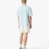 Blaues Oversized-T-Shirt mit kurzen Ärmeln und CC-Smile-Motiv im Tie-Dye-Look Blaues Oversized-T-Shirt mit kurzen Ärmeln und CC-Smile-Motiv im Tie-Dye-Look