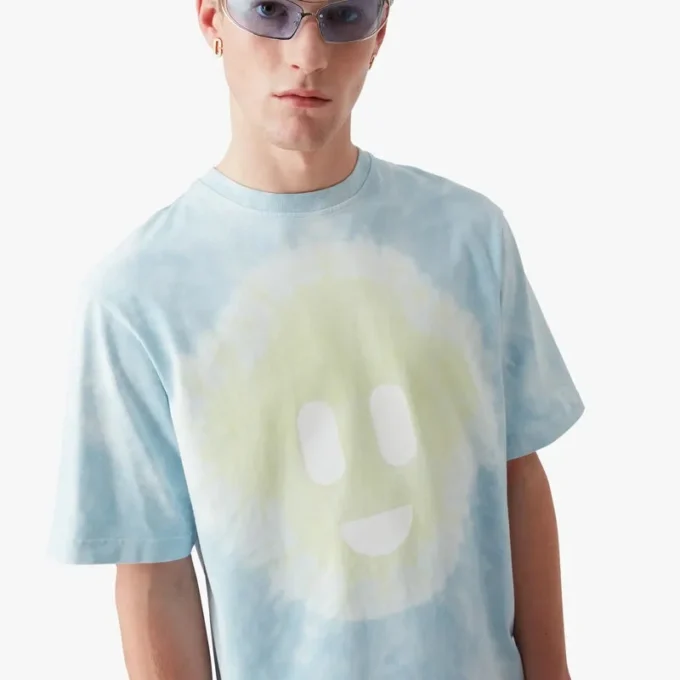 Blaues Oversized-T-Shirt mit kurzen Ärmeln und CC-Smile-Motiv im Tie-Dye-Look Blaues Oversized-T-Shirt mit kurzen Ärmeln und CC-Smile-Motiv im Tie-Dye-Look