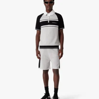 Kurzärmeliges Poloshirt mit Reißverschluss und metallischen Mesh-Streifen auf den Shorts