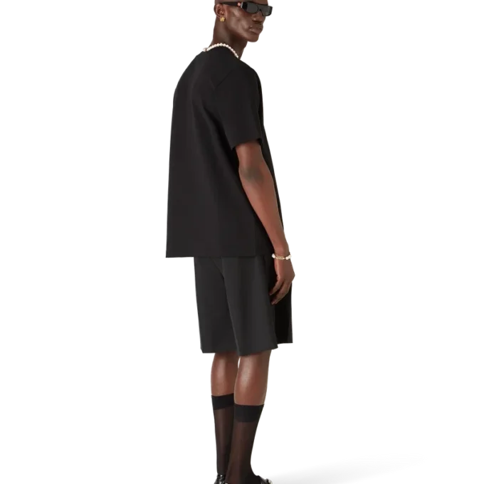 Manga-Tennisball-T-Shirt mit kurzen Shorts Manga-Tennisball-T-Shirt mit kurzen Shorts