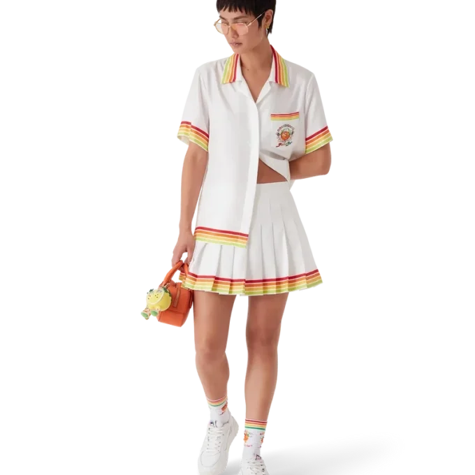 Orangefarbener Plisseerock aus Seidentwill mit Maskottchen