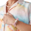 Rosa Perlenarmband mit Knoten