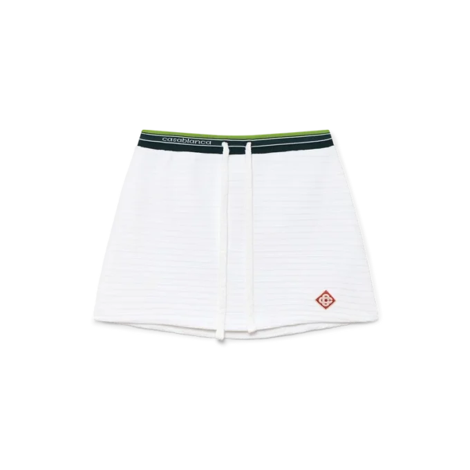 Tennisrock aus strukturiertem Velours Tennisrock aus strukturiertem Velours