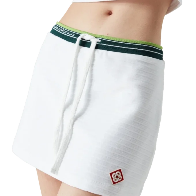 Tennisrock aus strukturiertem Velours Tennisrock aus strukturiertem Velours