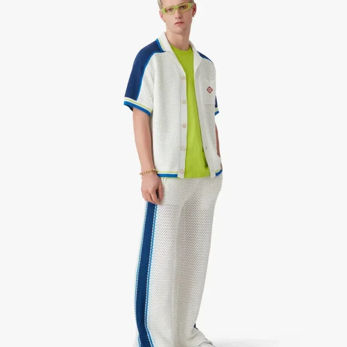 Weiß-blau gestreifte Mesh-Jogginghose Weiß-blau gestreifte Mesh-Jogginghose